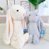 Bé thỏ nằm ngoan trong vòng tay, hoàn hảo để ôm ngủ mỗi đêm 🌙