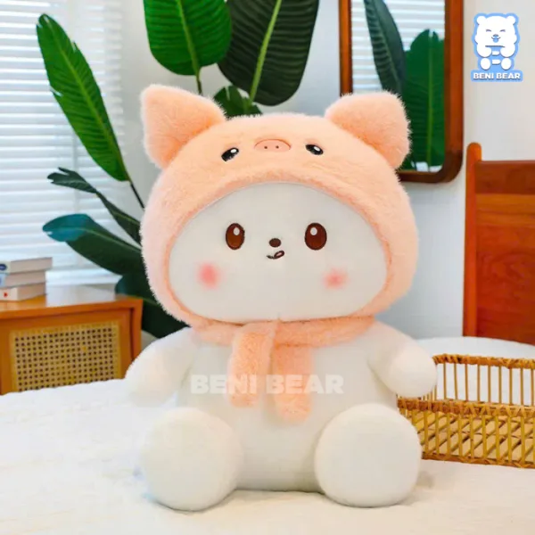 Gấu bông mùa đông đội mũ len, má hồng, dáng ngồi dễ thương
